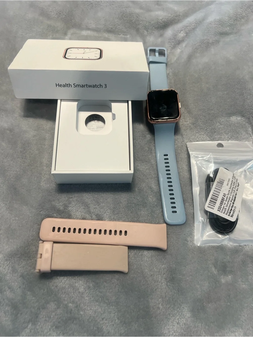 Unbranded Smart Fitness Watch with Blue Strap and Rose Gold Case